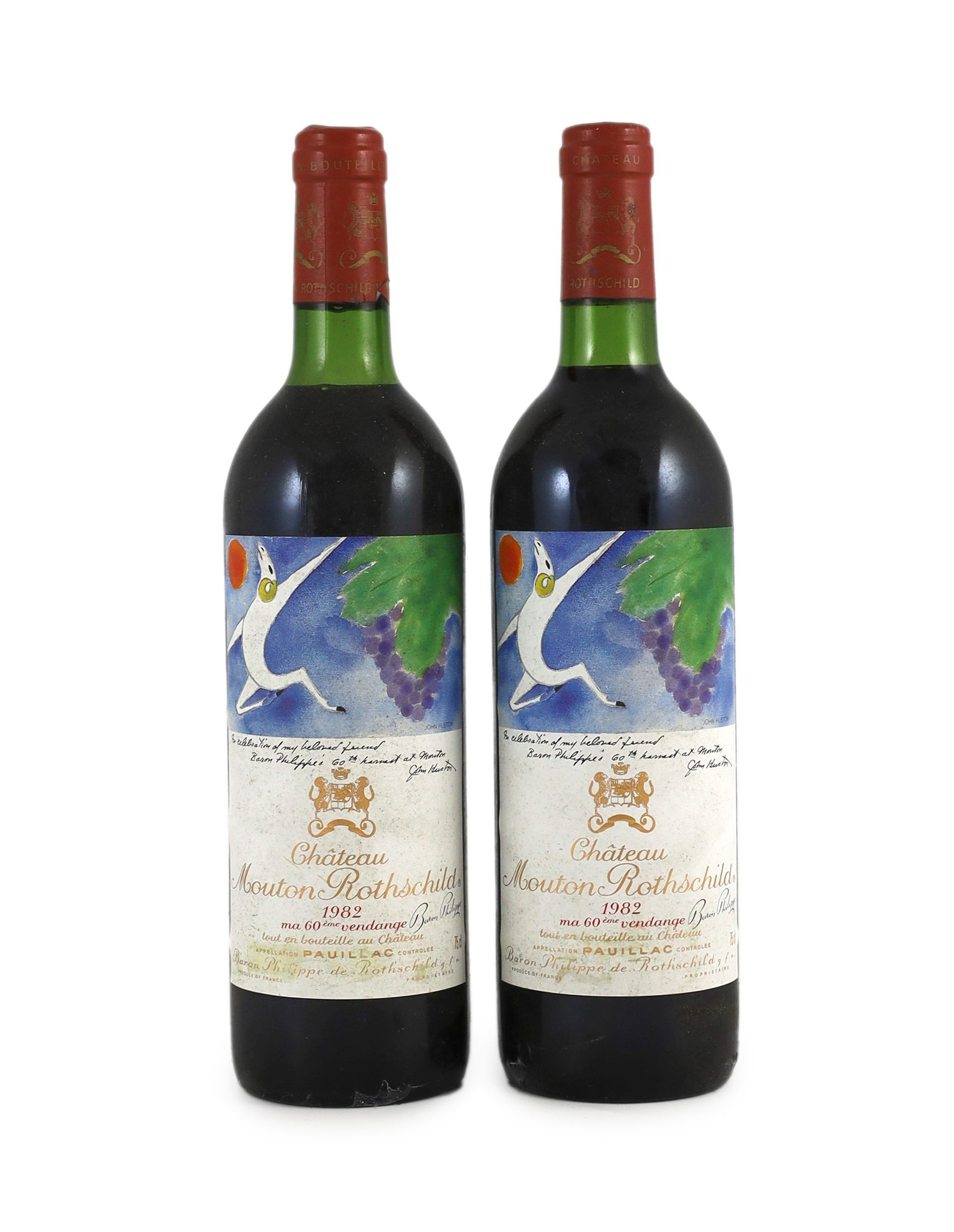 Two bottles of Chateau Mouton Rothschild 1982, height 30cm